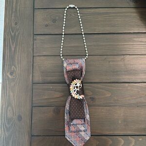 Handmade Upcycled Necktie Bib Necklace with Brooch
Unique & Handmade!